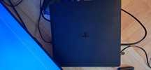 PS4 Slim 512 GB + manetă+ 12 jocuri
