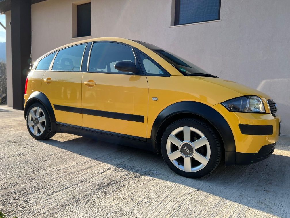 Audi A2 1.6 FSI | 2004 | Benzină | Culoare Galbenă

---

Audi A2