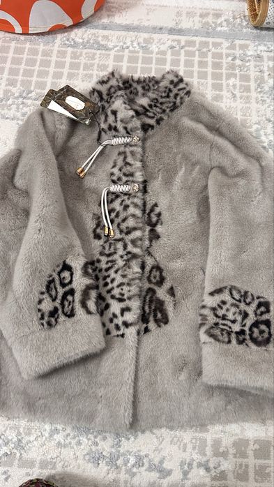 Эко шуба, очень теплая.