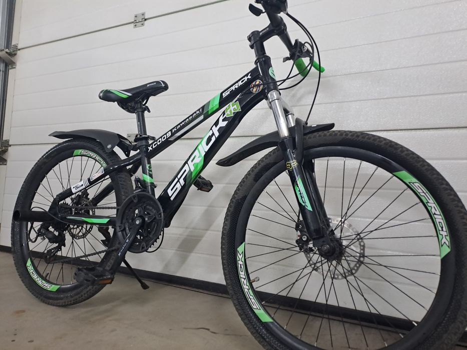 Подростковый велосипед Sprick xc009  (черно-зеленый)