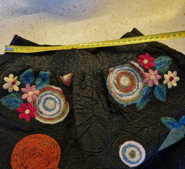 Fustă mini model Desigual ,cu banda elastică la mijloc.