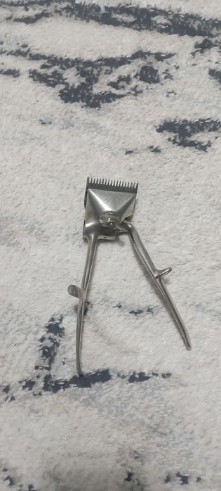 Антикварная машинка для стрижки волос