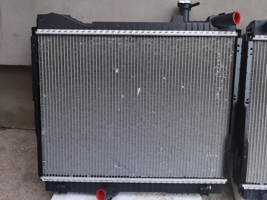 Radiator ORIGINAL Nissan Cabstar Renault Maxity NT400 vas expansiune Atleon 150CP piese