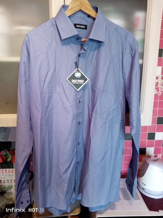 Новые мужские рубашки две штуки 54 размер.