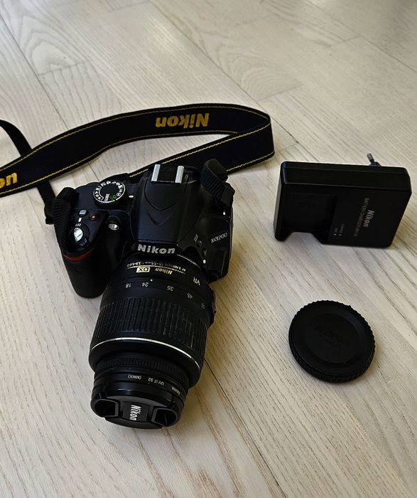 Nikon D3200l SLR camera with an 18-55mm VR lens.