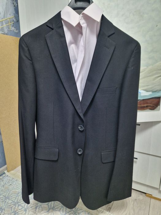 Продам костюм с брюками размер 44,