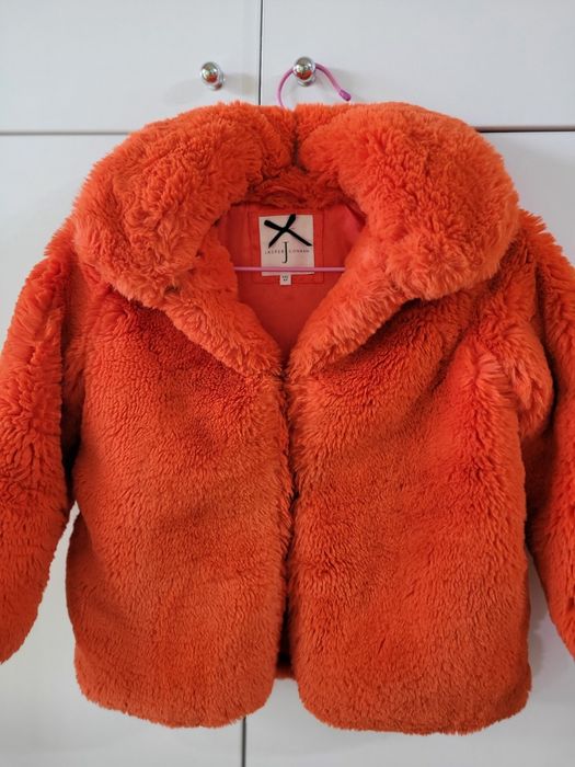 Детско оранжево пухено палто 8-9 години