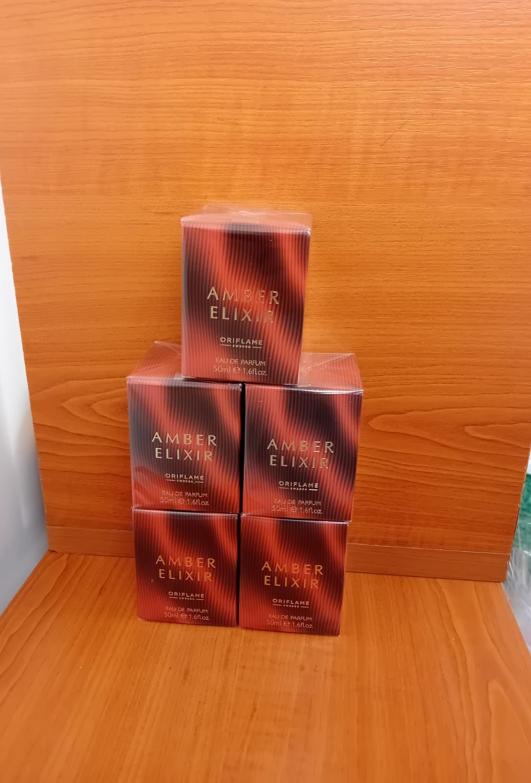 Transport gratuit &Amber Elixir Oriflame