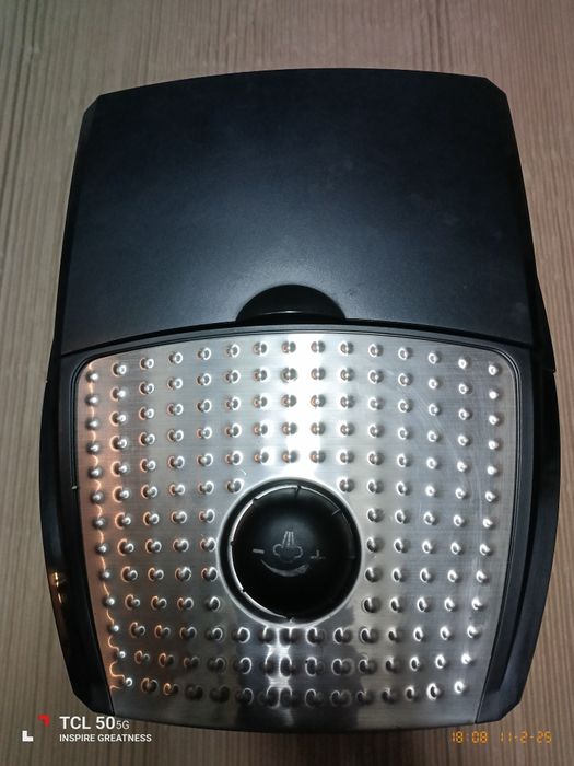 Кафемашина DeLonghi.