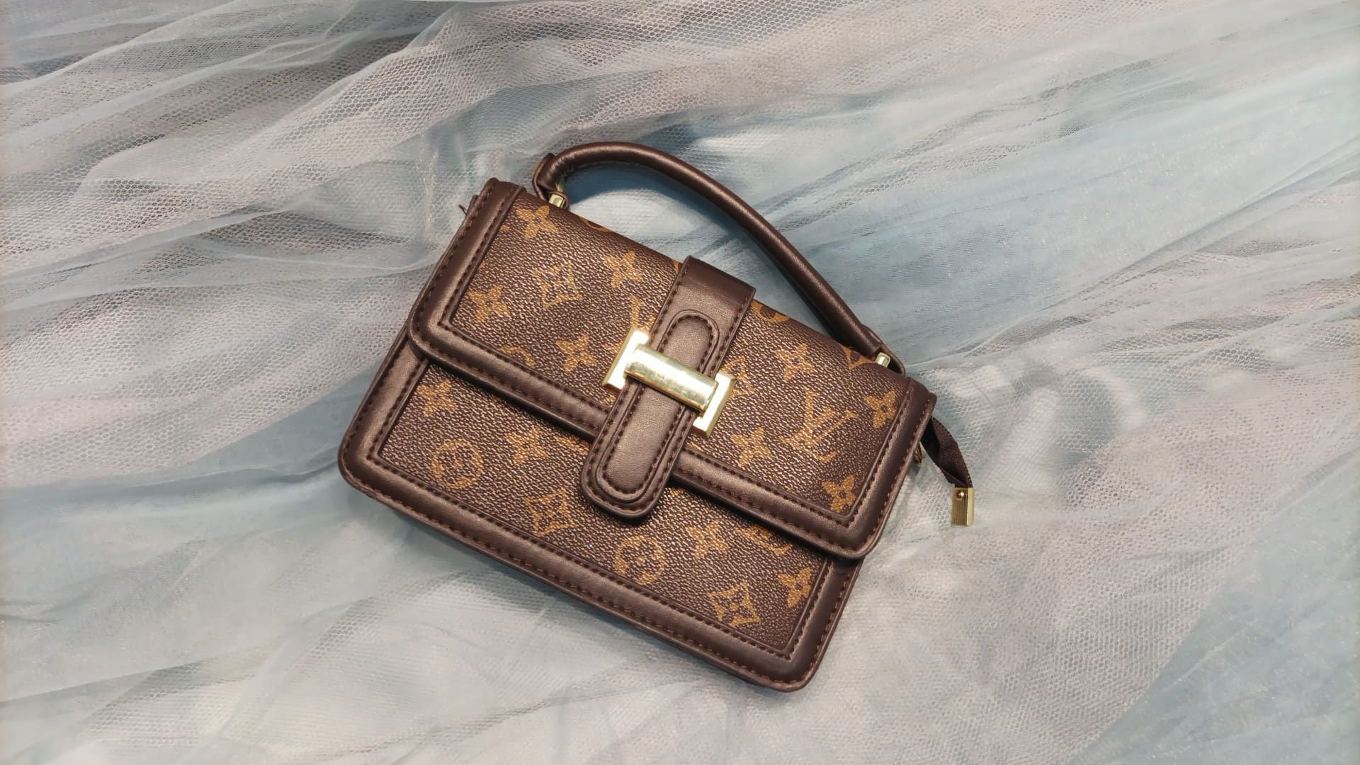 Сумка/клатч  Louise Vuitton