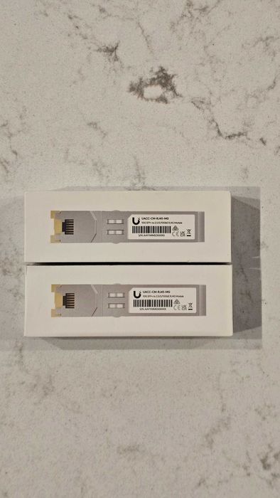Vând 2 bucăți Ubiquiti SFP+ to RJ45 Adapter