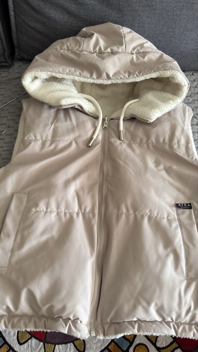 Двухсторонняя жилетка