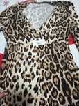 Compleu   leopard damă