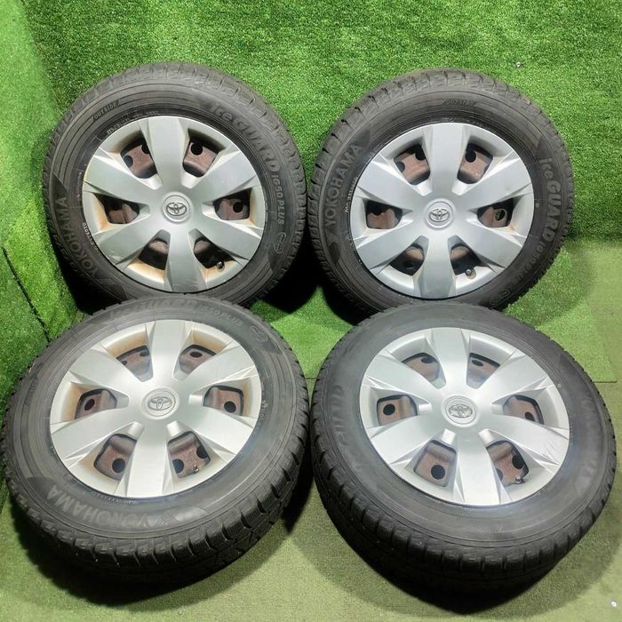 Продам Зимние шины Yokohama 215/60 R16 железный диск с колпаком