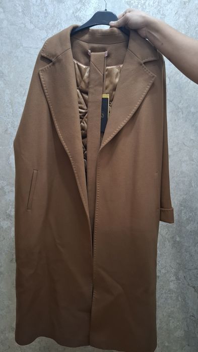 Женское пальто продам новый