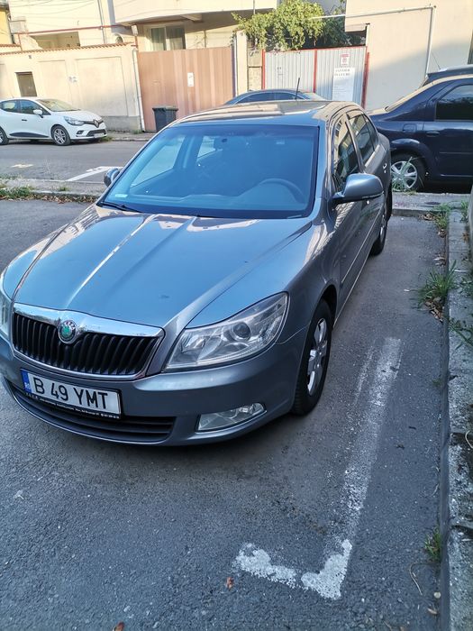 Vând skoda octavia 2 facelift an 2013