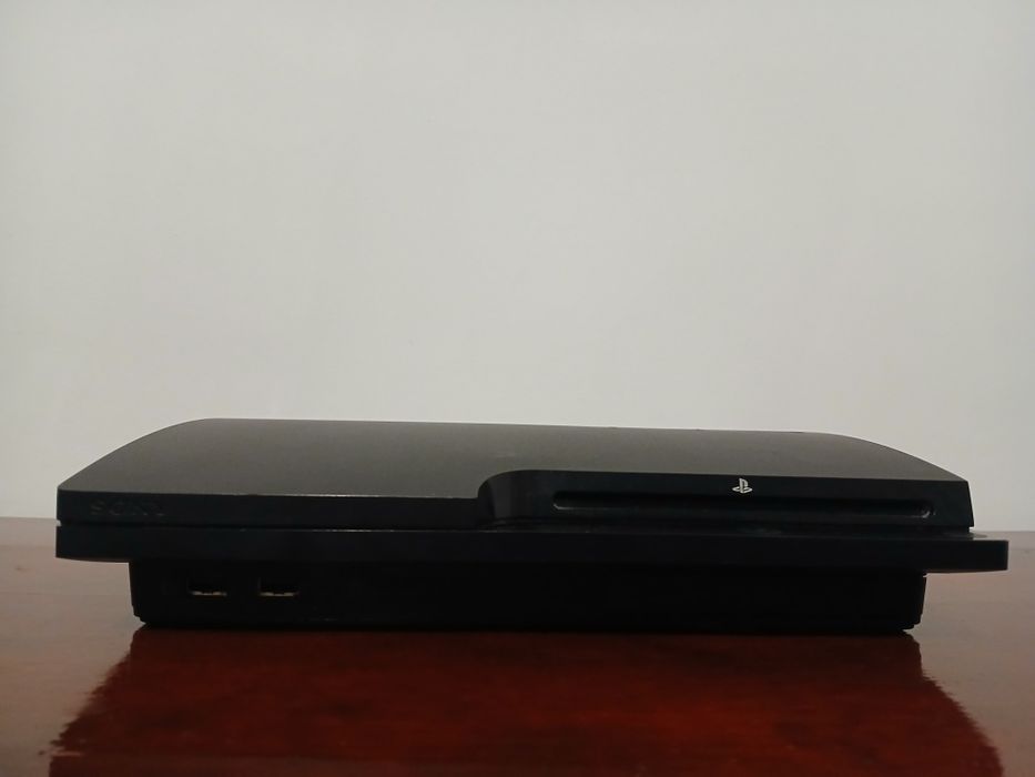 Vând ps3 cu o manetă