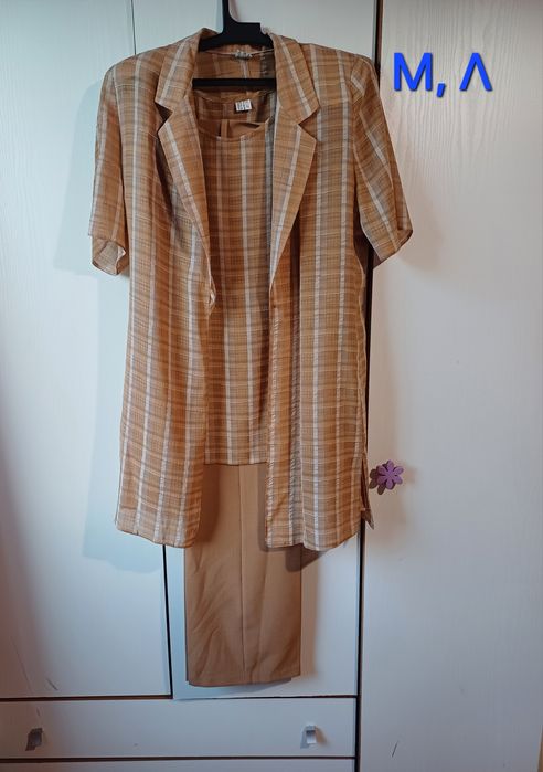 Разпродажба на нови дамски костюми, различни размери, цена 20лв за бро