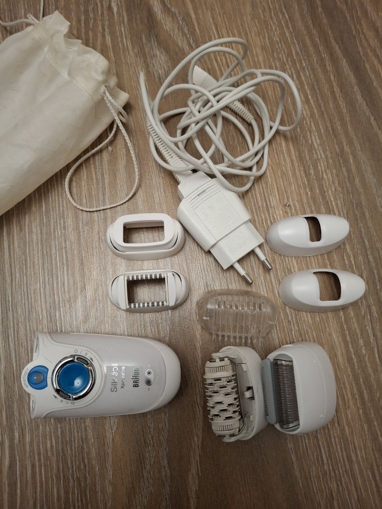 Скрабер аппарат для чистки лица и эпилятор Braun.