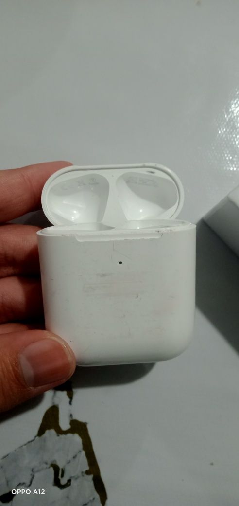 Apple AirPods, безпроводные наушники.