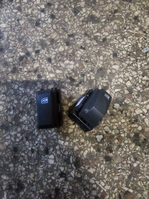 Buton blocare geamuri spate logan sandero 2
