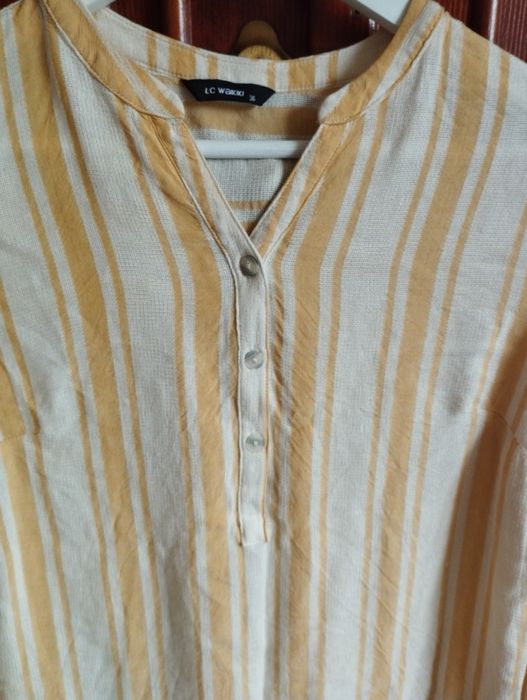 Bluză de culoare bej cu dungi verticale de culoare galbenă, mărimea 36