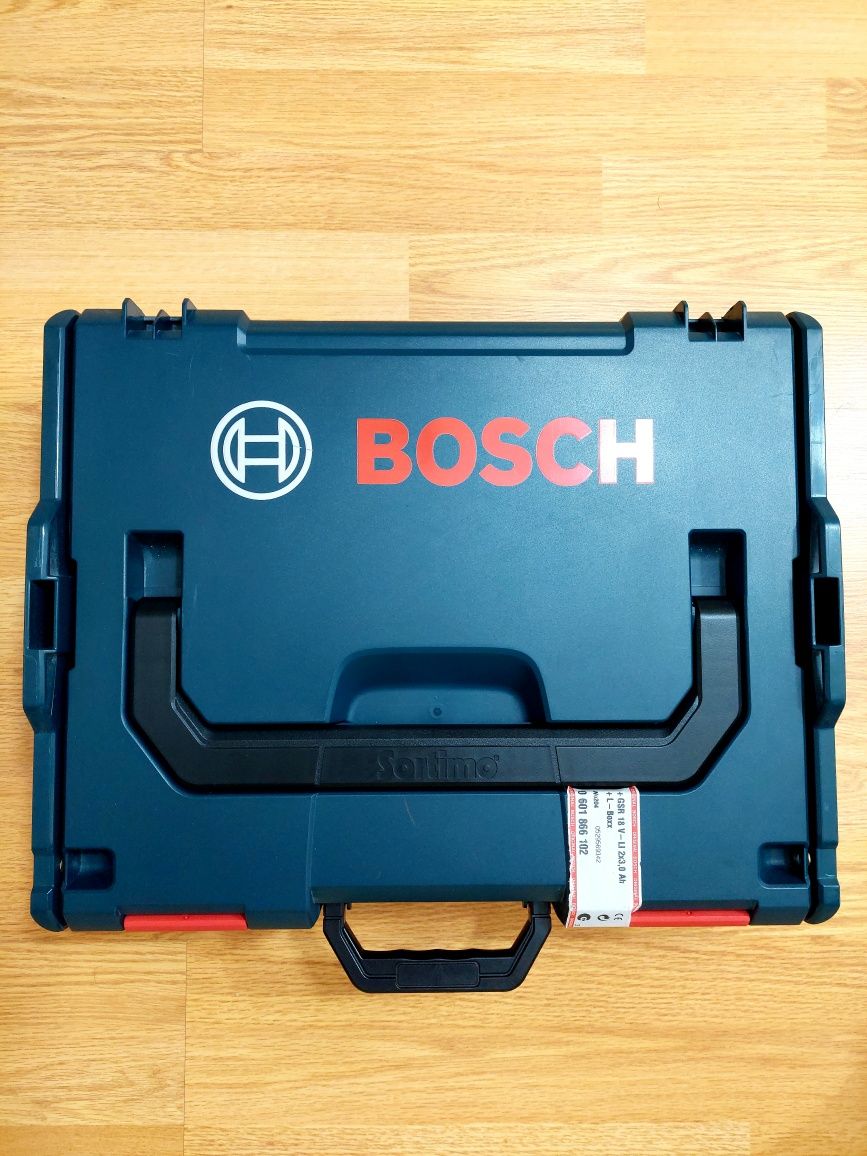 Mașină de găurit Bosch GSR 18 V-LI cu 2 baterii de 4 Ah și încărcător