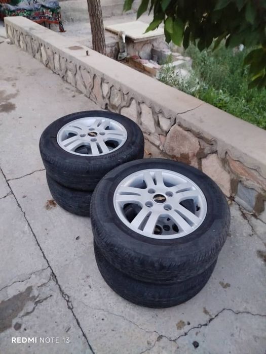 Продам  диски  с резиной.