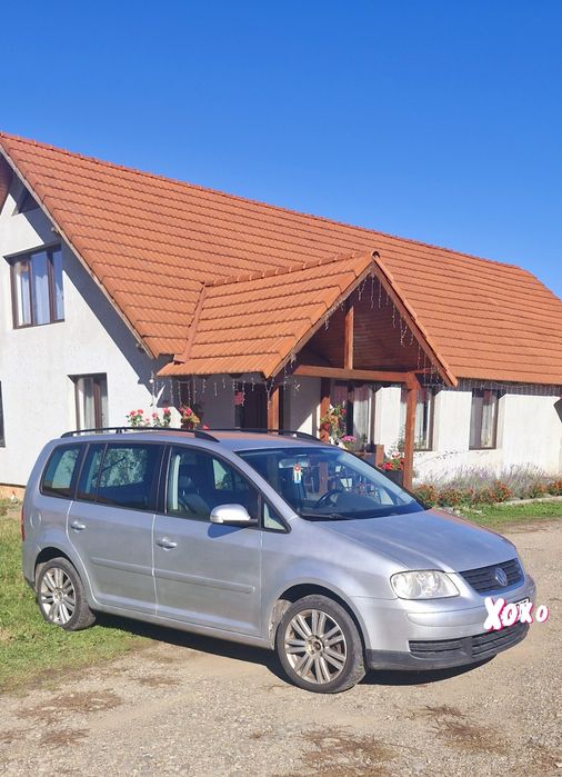 Vand touran 2007 sau schimb cu t4 doka