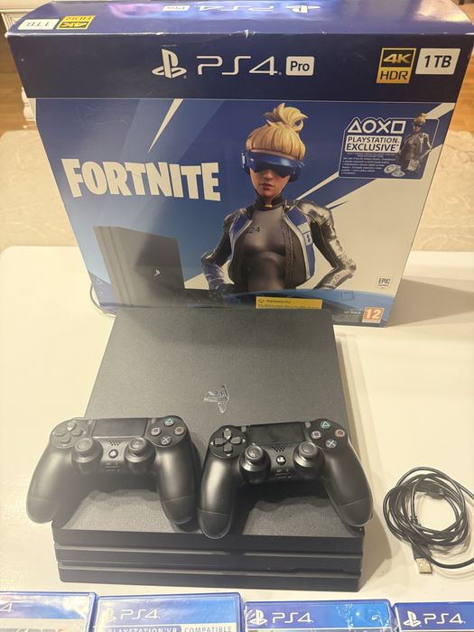 Ps 4 Pro 4K HDR 1 TB PlayStation cu 8 jocuri