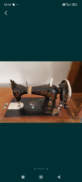 Mașină de cusut singer