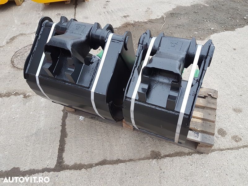 New Holland lb115 Producem cupe cu sistem de cuplare rapida RETROMATIC