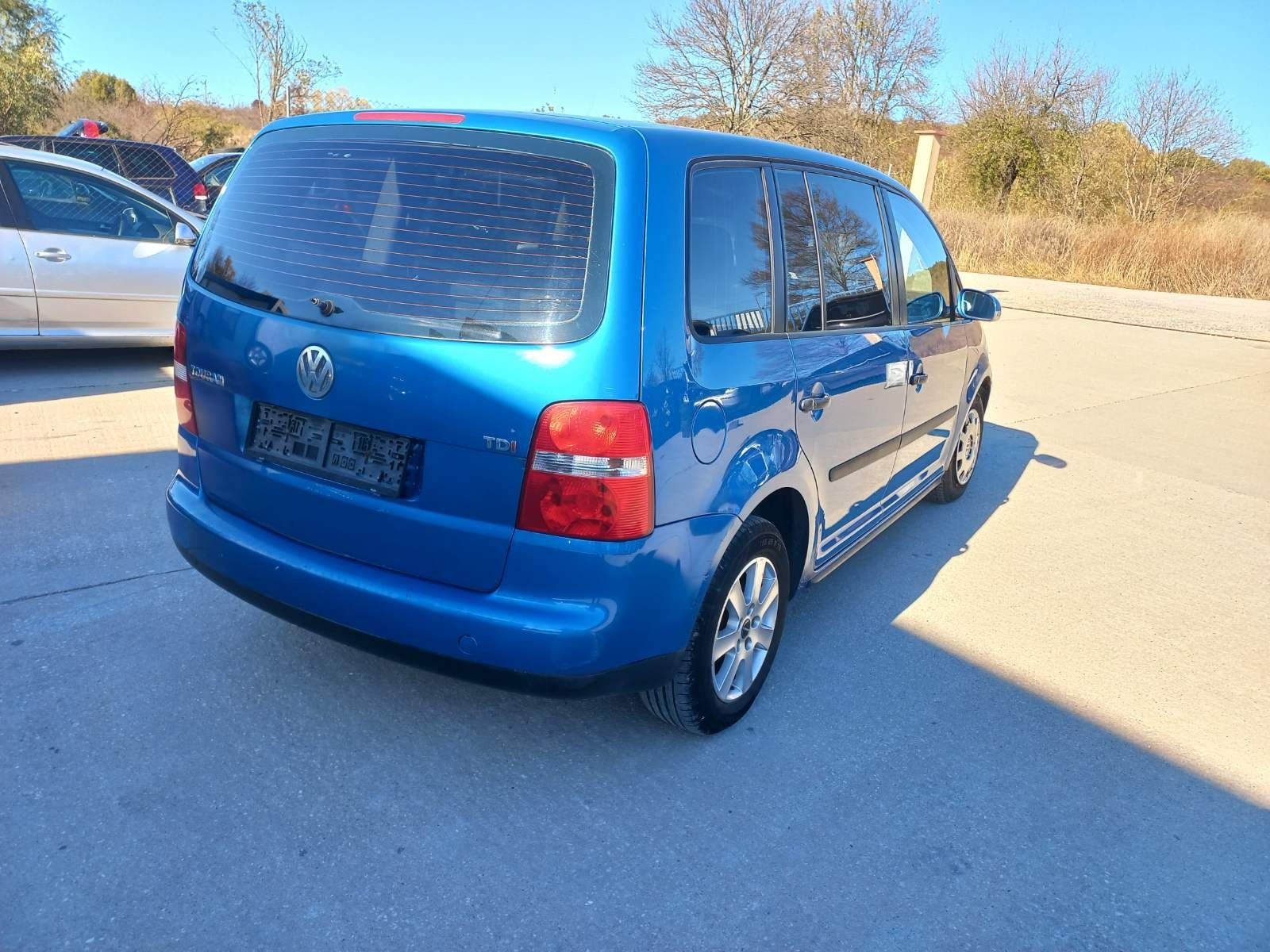 Vw Tuaran 1.9 101кс код на мотораAVQ