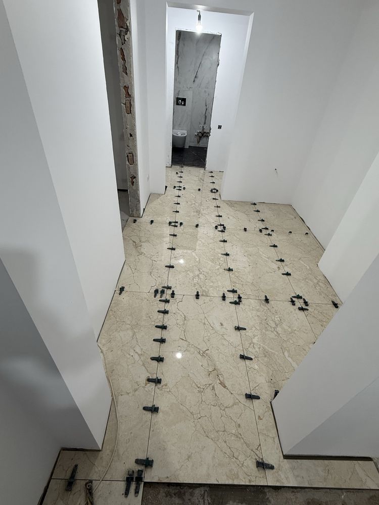 Instalatii sanitare, electrice, amenajari ( gresie, parchet etc)