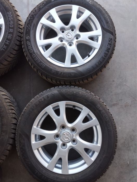 Продавам зимни гуми с лети джанти за всякъкъв модел на мазда