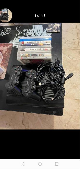 PlayStation 3 super slim in stare perfecta de functionare 9 jocuri