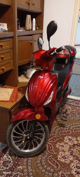 Vind scuter electric