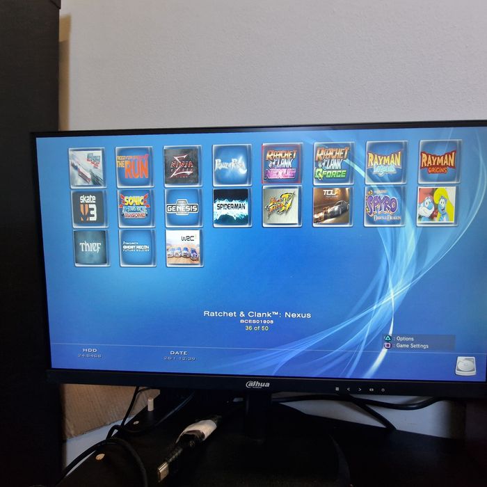 Playstation 3 slim modat Hdd 500gb 2 manete PS3 50 jocuri