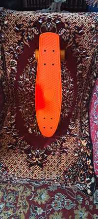 Skateboard portocaliu