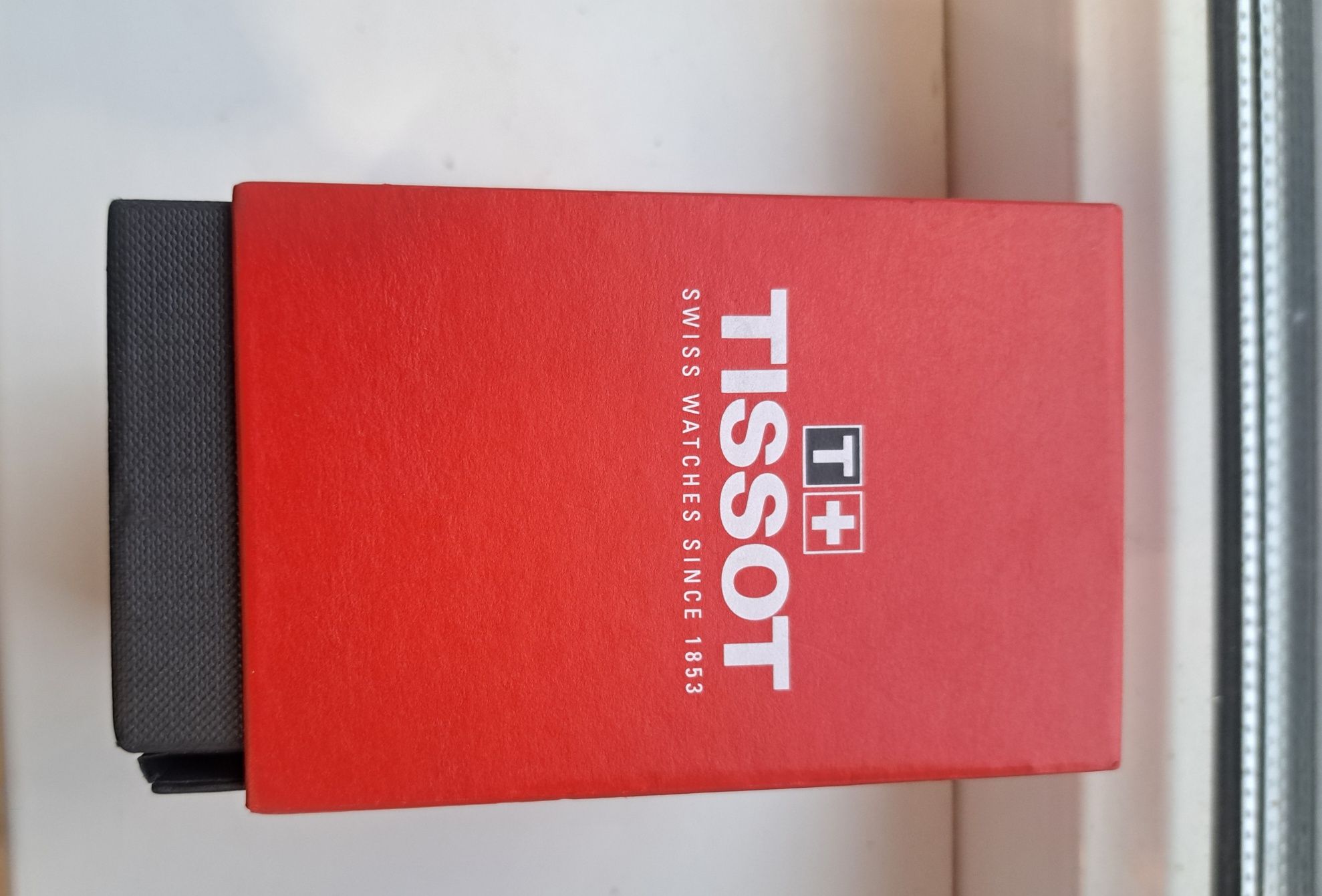 Часы     Tissot.