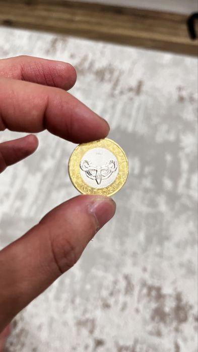 Монета 100 тенге,