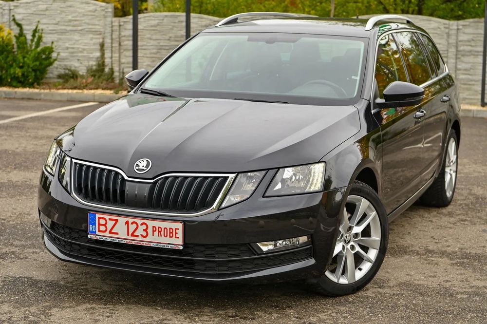 Skoda Octavia Ambition/ Piele cu textil/ Dublu climatronic/ Volan sport/ Garantie