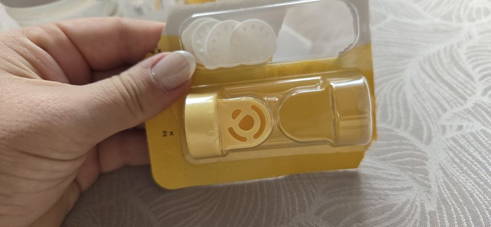 Ръчна помпа за кърма Медела и шишета