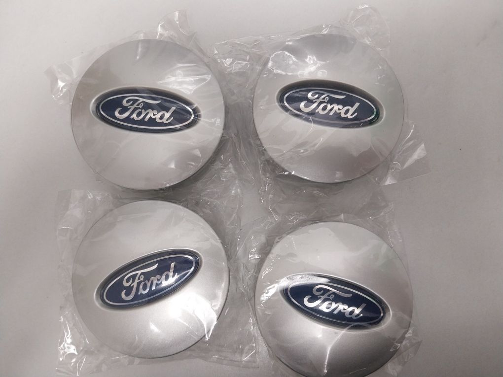 Set 4 capace 54mm, Ford, ARGINTIU/ALBASTRU, pentru jante aliaj