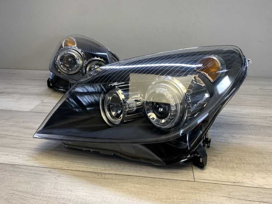 Faruri sport Opel Astra H GTC Twintop Angel Eyes look negru lupa NOU
