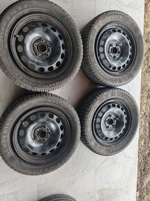 Vând jante+cauciucuri de Wv Passat 215/60/16 M+S 5/112/16