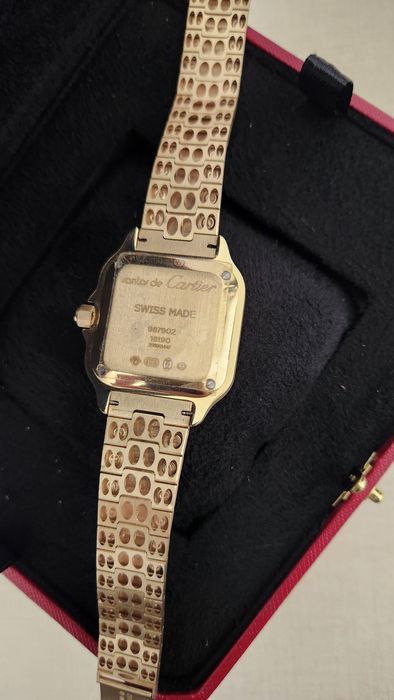 Золотые часы Cartier Santos