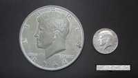 Eseu monetar  J F Kennedy half dollar 1964