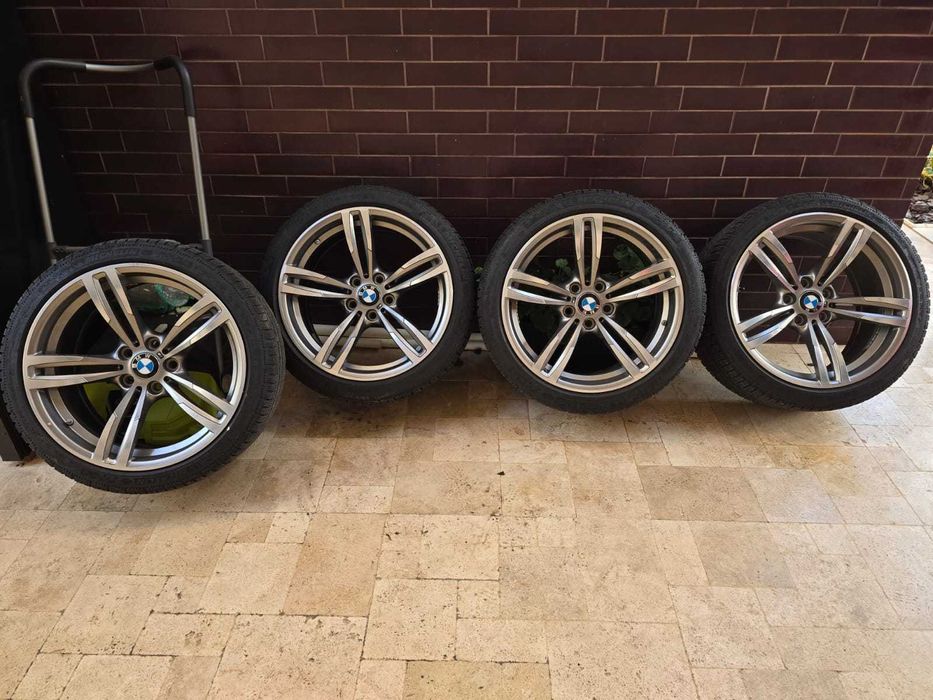 Set roti originale BMW 437M cu anvelope iarna - stare excelenta