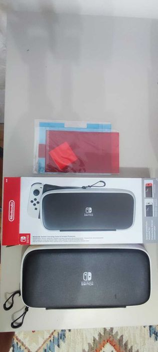 Nintendo Switch cu husa, doua jocuri si cu folie protectie ecran